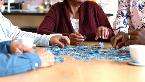Image of seniors doing a jigsaw puzzle