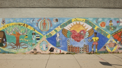 A mural depicts health care in the New Brunswick community outside the Eric B Chandler Health Center
