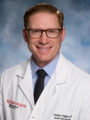 A headshot of Rutgers professor Zachary Englert