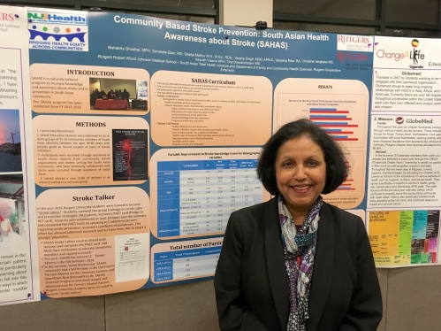 Sunanda Gaur presenting a poster session about research on community-based stroke prevention amongst South Asians.
