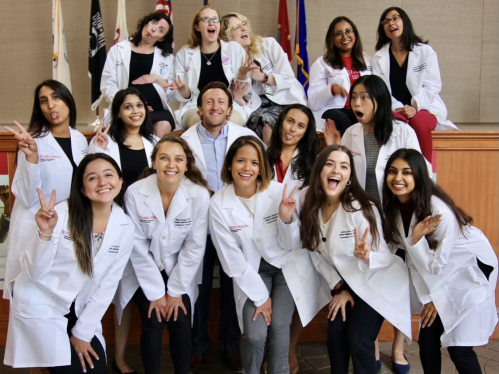 Family Medicine residents smiling, laughing and making funny faces for a picture
