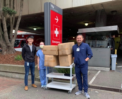 Project SCIFI participants donate boxes of medical-grade PPE supplies in March 2020 to UCSF Emergency Department