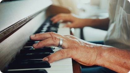 Image of man playing the piano