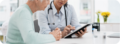 Image of physician consulting with older woman 