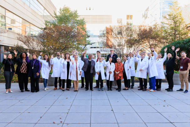 50th anniversary department group photo wave
