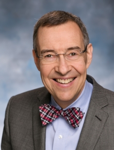 Headshot of David August
